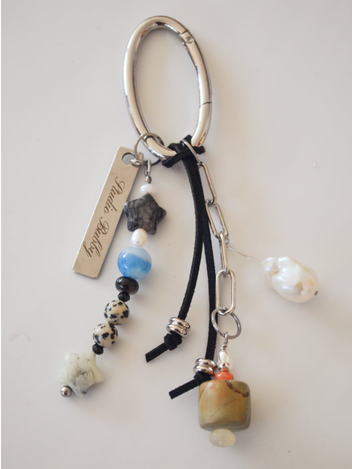 Keychain with beads and charms on a white background