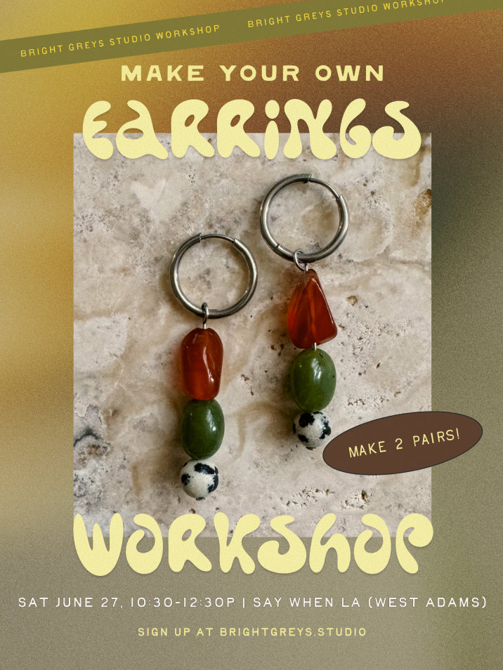 Advertisement for a 'Make Your Own Earrings' workshop with earrings on a stone surface.